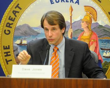 State Insurance Commissioner Dave Jones talks with fire victims Thursday.