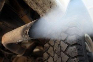 MIAMI - JULY 11: Exhaust flows out of the tailpipe of a vehicle at , "Mufflers 4 Less", July 11, 2007 in Miami, Florida. Florida Governor Charlie Crist plans on adopting California's tough car-pollution standards for reducing greenhouse gases under executive orders he plans to sign Friday in Miami. (Photo by Joe Raedle/Getty Images)