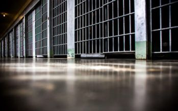 CA settles prison suit, curbing solitary